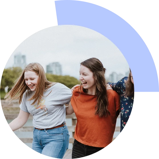 Young people laughing together outdoors